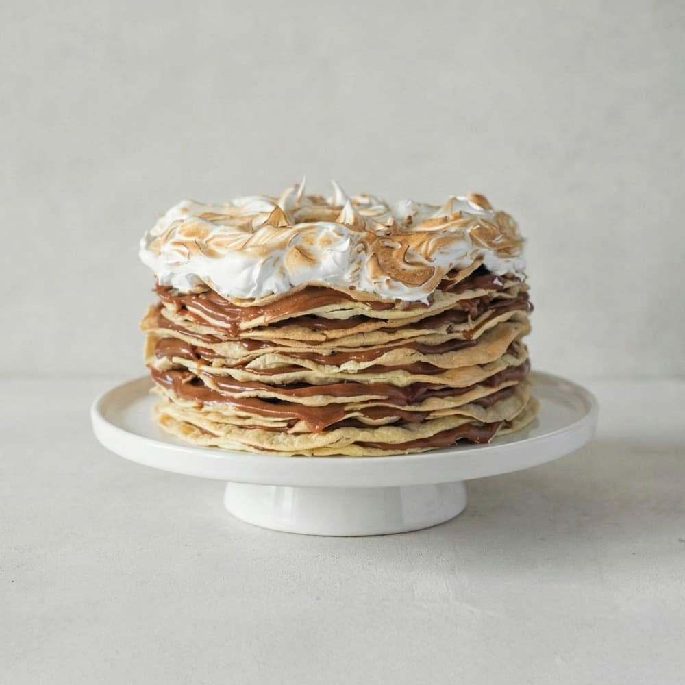 Torta Rogel artesanal de 22 cm · 10 a 12 porciones